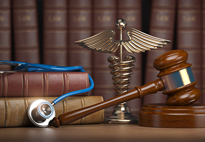 legal and practical end of life care training image of a gavel and stethoscope by project compassion