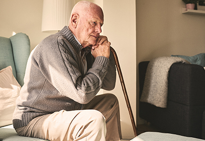 What do Patients Think image of Elderly man sitting alone at home by project compassion